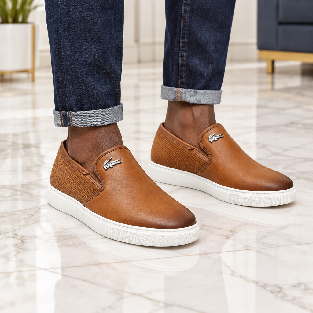 Man wearing tan leather woven-heel slip-on sneakers