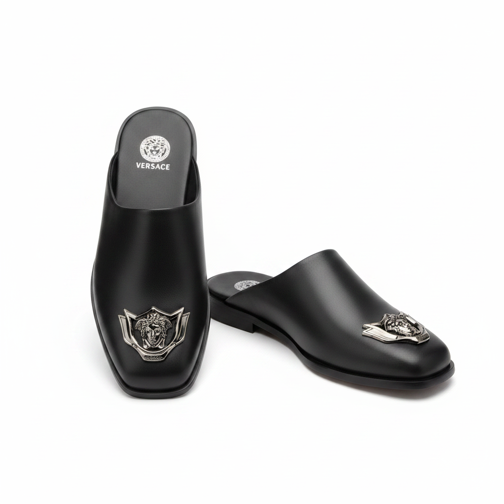 Black leather lion badge half shoe mule ghost mannequin product shot, plain white background