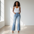 Light blue flare jeans with embroidery front view