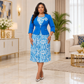 Woman wearing a blue patterned midi dress and fitted jacket set
