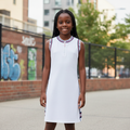 Young Nigerian girl wearing white sporty tape dress