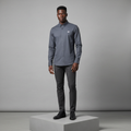 Nigerian male model wearing charcoal grey plain long-sleeved shirt, front view
