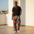 Male model wearing black ribbed abstract print polo and trouser two-piece set
