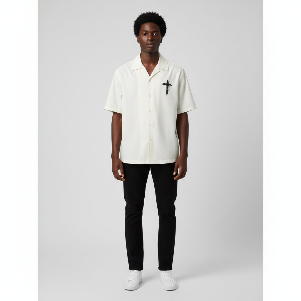 Man wearing the cream cross motif camp collar shirt