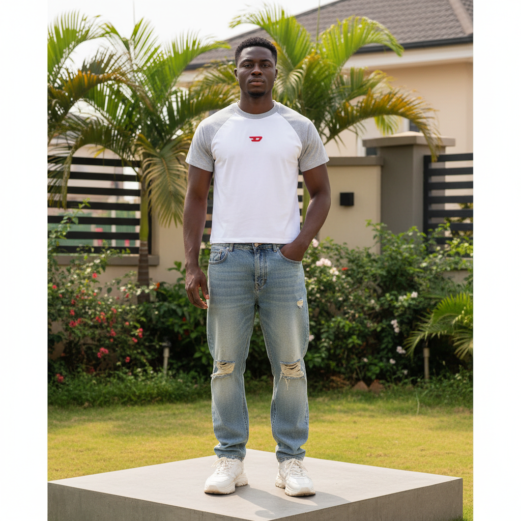 Nigerian male model wearing white and grey raglan crop t-shirt – full body lifestyle shot