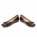 Women's dark brown patent croc flat pumps with bar buckle – ghost mannequin pair view
