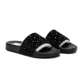 Men's black velvet slide sandals with scattered silver crystal rhinestone studs on wide strap, ghost mannequin pair view on white background