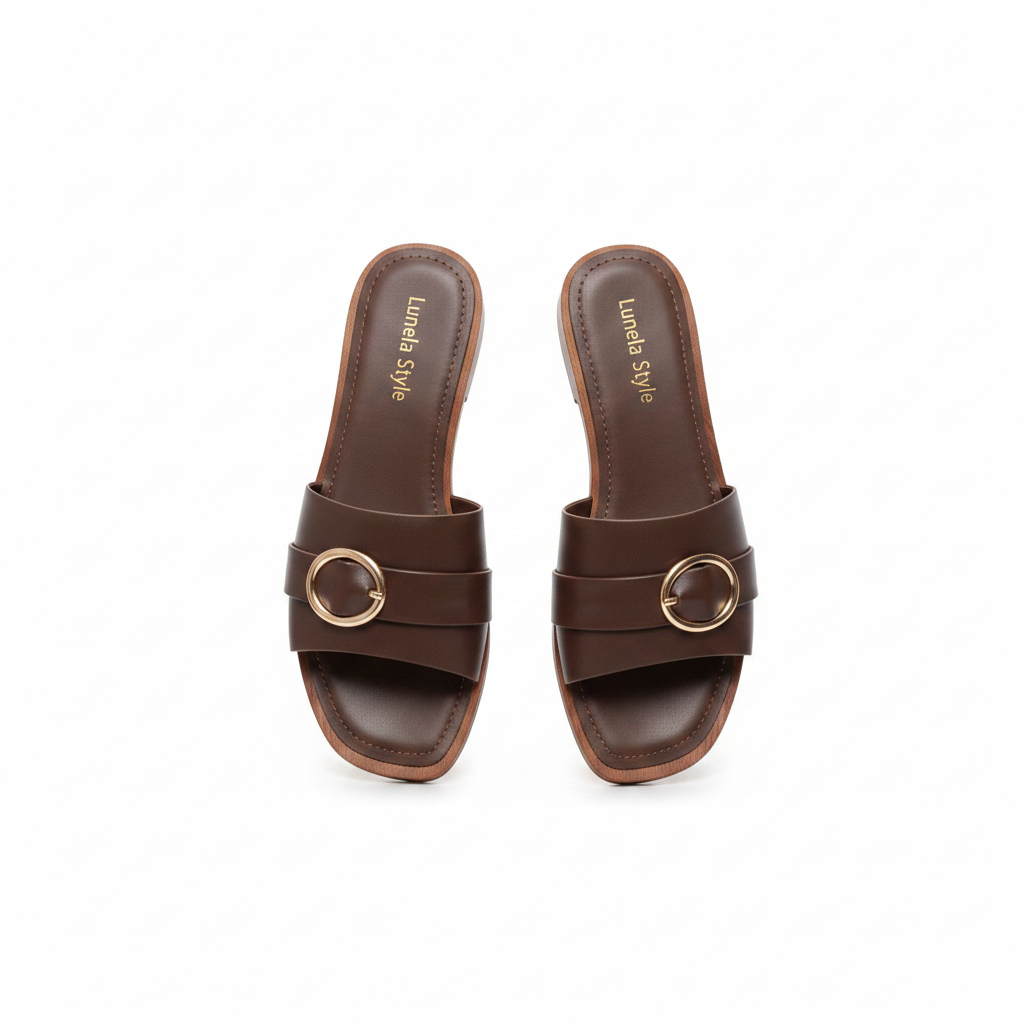 Women's dark brown cross-strap flat slide with gold ring buckle — ghost mannequin pair view
