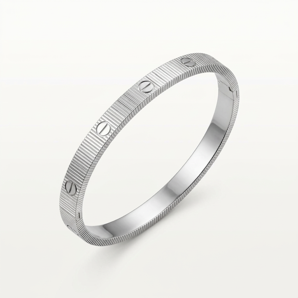 Silver-tone ribbed Love bracelet with screw-head motifs on white