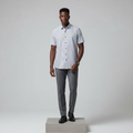 Nigerian male model wearing white navy pinstripe short-sleeved shirt, front view