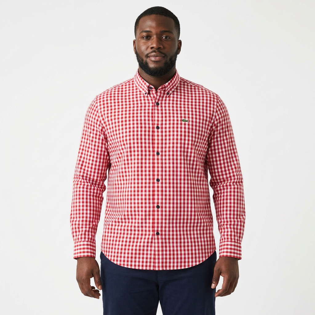 Adult Black model wearing a red and white gingham long-sleeve shirt