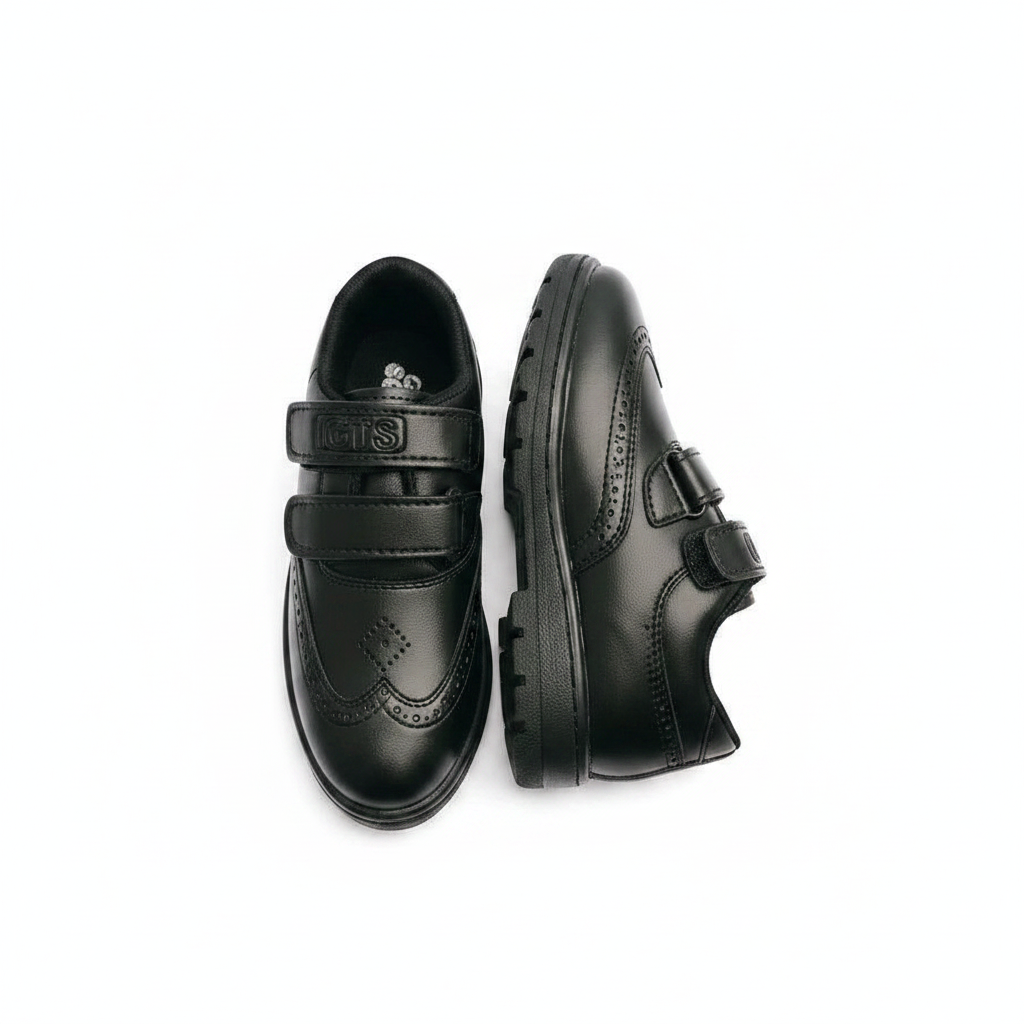 Kids black velcro brogue school shoe pair — ghost mannequin front and side view