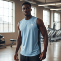 Under Armour light blue sleeveless sport vest with grey side panels on male model