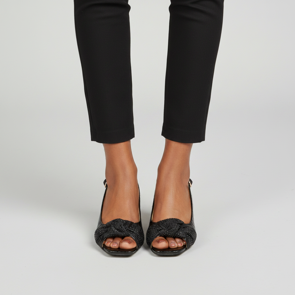 Women's Croc-Embossed Bow Slingback Low Wedge Sandal - Black Model Editorial Leg Zoom