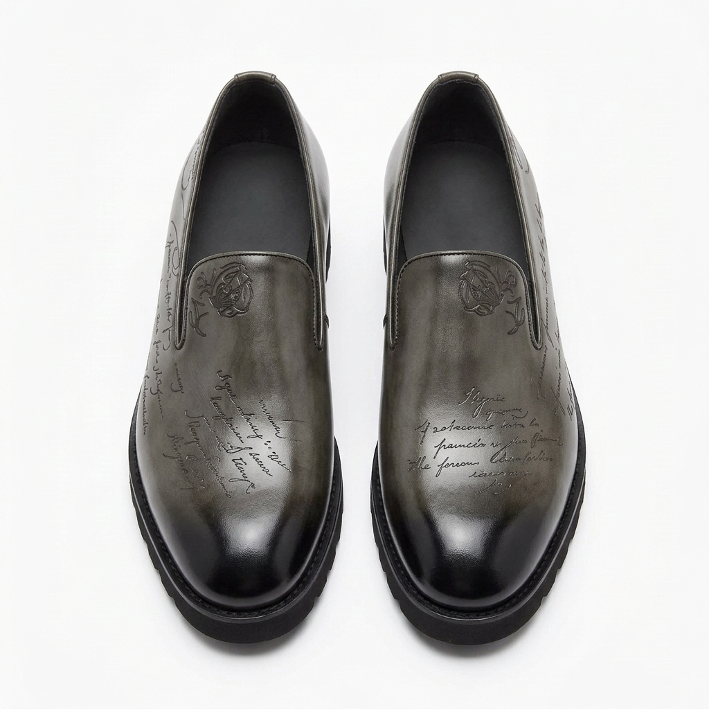 Straight-on smoky charcoal-grey script-detail slip-on shoes with darker toes