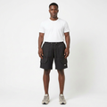Full-body model wearing black pinstripe cargo shorts