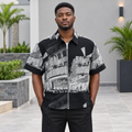 Men's black and grey graphic zip-front shirt on Black Nigerian model