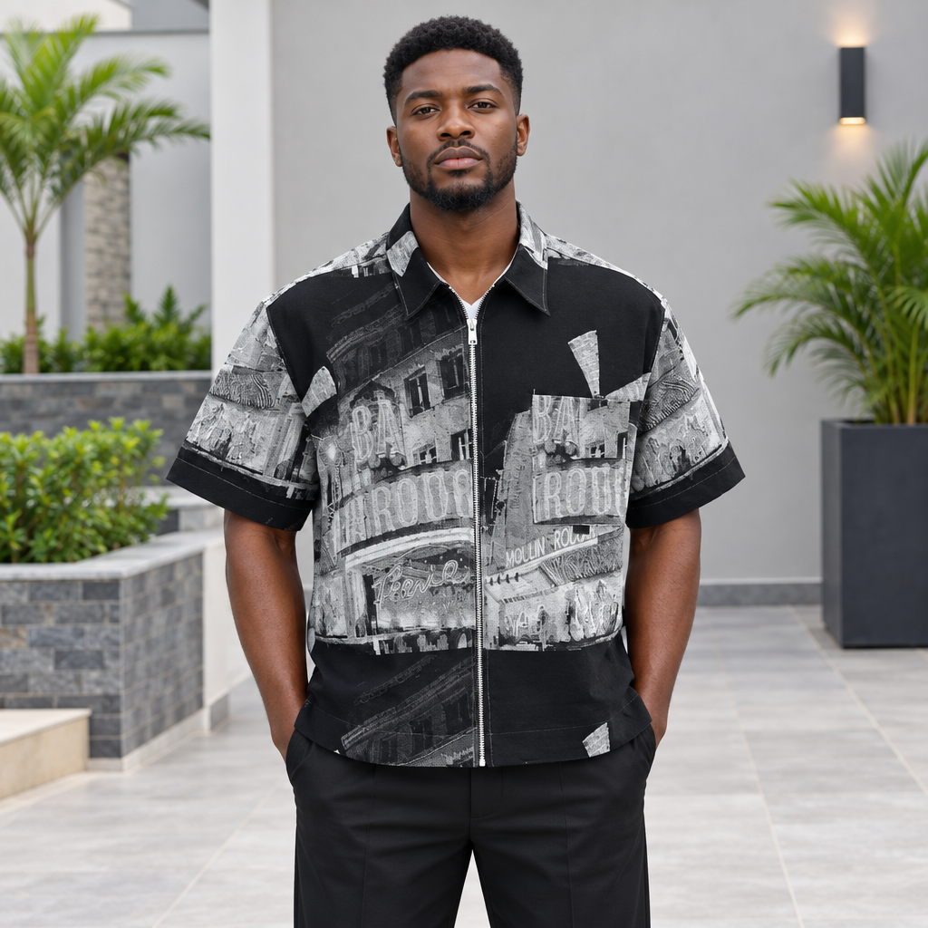 Men's black and grey graphic zip-front shirt on Black Nigerian model