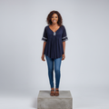 Nigerian female model wearing Navy Blue Sequin Trim Babydoll Top - front view