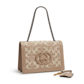 Single front view of taupe and cream patterned chain bag on white