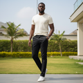 Nigerian male model wearing black slim-fit chino trousers