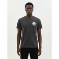 Young Nigerian male wearing dark charcoal orb logo minimal crew neck tee