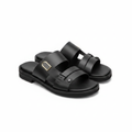 Black leather double-strap gold hardware slide sandal ghost mannequin product shot, plain white background