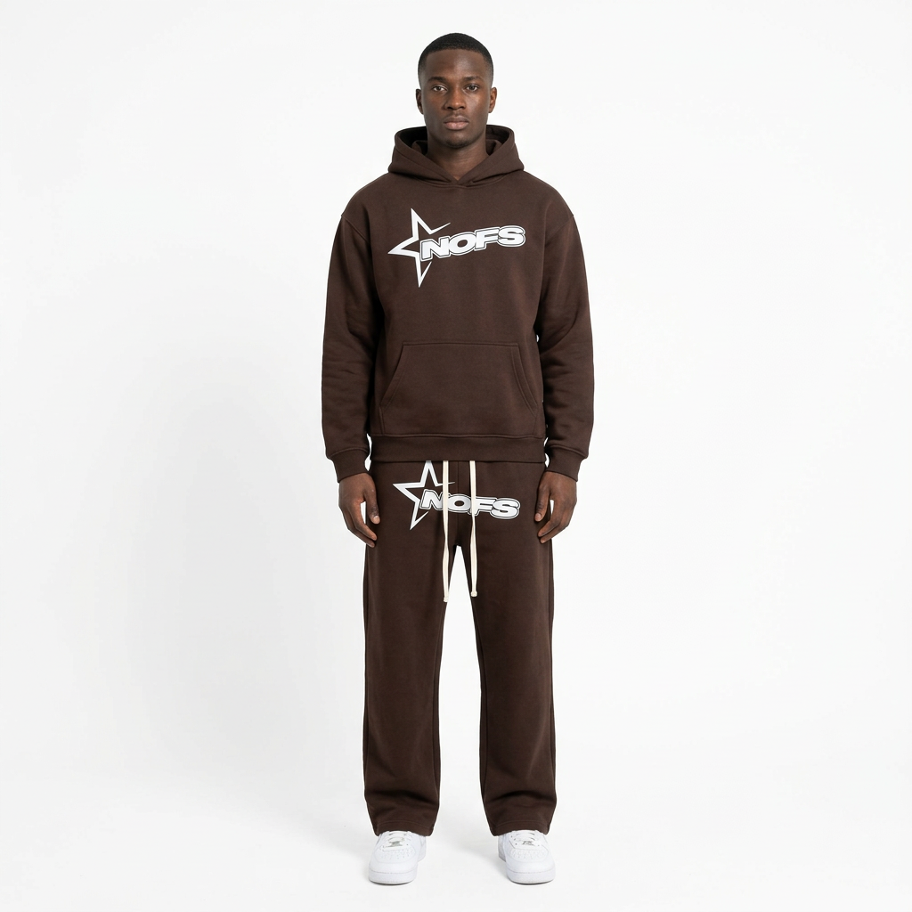 Adult Black model wearing a brown star-graphic hoodie and trouser set