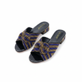 Ghost mannequin pair view of gold and purple rhinestone crossover knot block heel mules