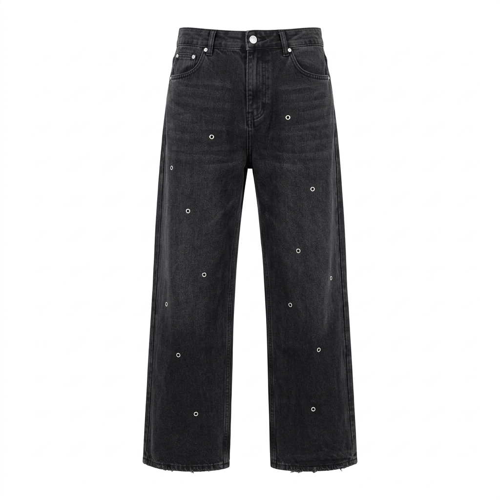 Black wide-leg jeans with scattered silver-tone eyelets and lightly frayed hems