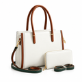 Ivory tote with brown handles and matching purse on white
