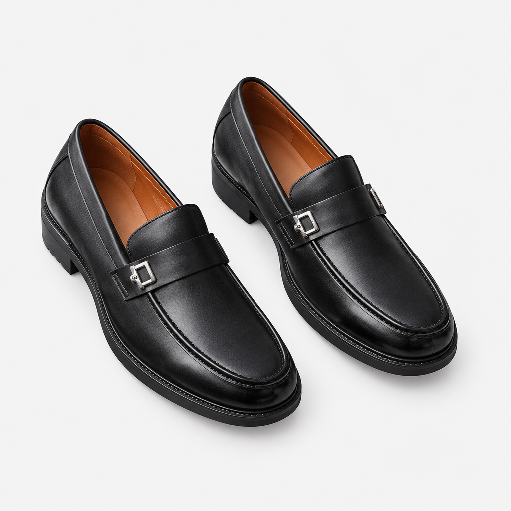 Black men's square-buckle loafers shown as a complete pair