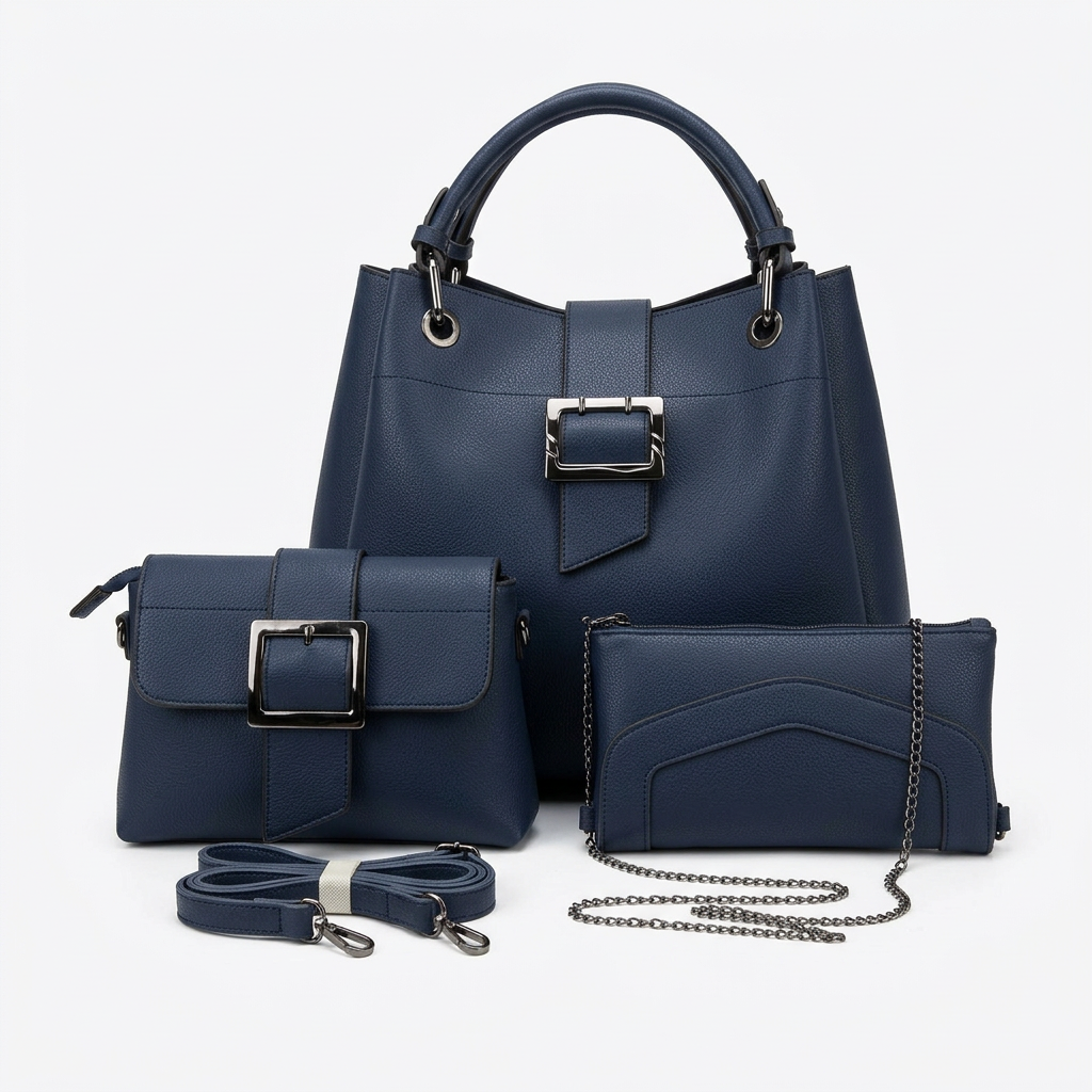 Navy three-piece bag set with silver-tone buckle hardware on white
