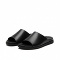 Black smooth leather minimal open-toe slide sandal ghost mannequin product shot, plain white background