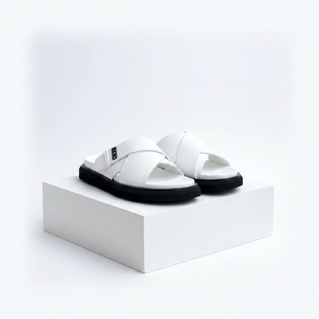 Men's white leather cross-strap slide sandals pair on white platform