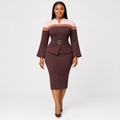 Black Nigerian woman wearing chocolate brown blush-panel belted peplum dress