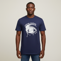 Black Nigerian male model wearing a navy Dream Maker graphic T-shirt