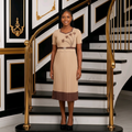 Model shot – Ntiwi Collection Beige Miyaki Pleated Midi Dress