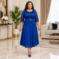 Woman wearing a royal blue lace peplum midi outfit