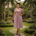 Women's dusty rose lapel butterfly-belt pleated midi gown – Nigerian model lifestyle shot