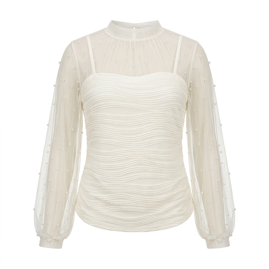 Ivory ruched blouse with dotted sheer sleeves and yoke on an invisible mannequin against white