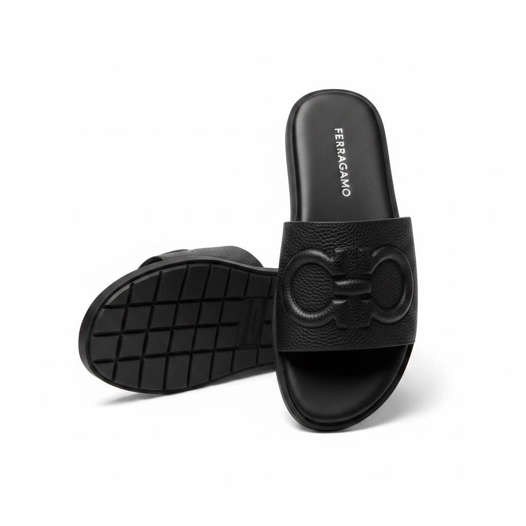 Black pebbled leather Gancini hardware slide sandal ghost mannequin product shot, plain white background