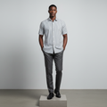 Nigerian male model wearing white charcoal bold stripe short-sleeved shirt, front view