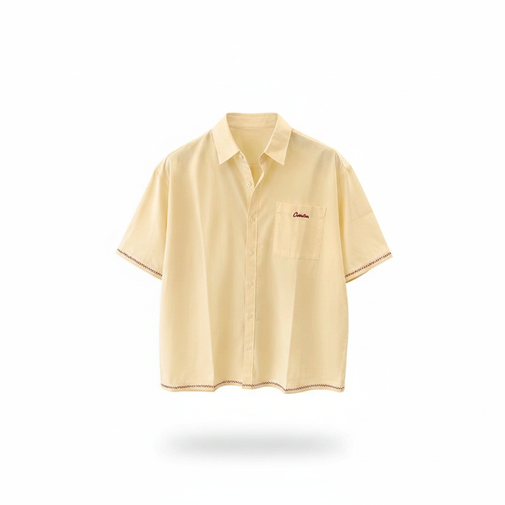 Men's cream off-white boxy short-sleeve shirt with red script embroidery and zigzag trim, ghost mannequin front view