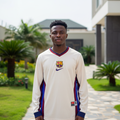 White and maroon blue panel long-sleeve retro football jersey — Nigerian male model front view