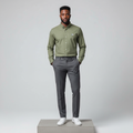 Nigerian male model wearing olive green plain long-sleeved shirt, front view