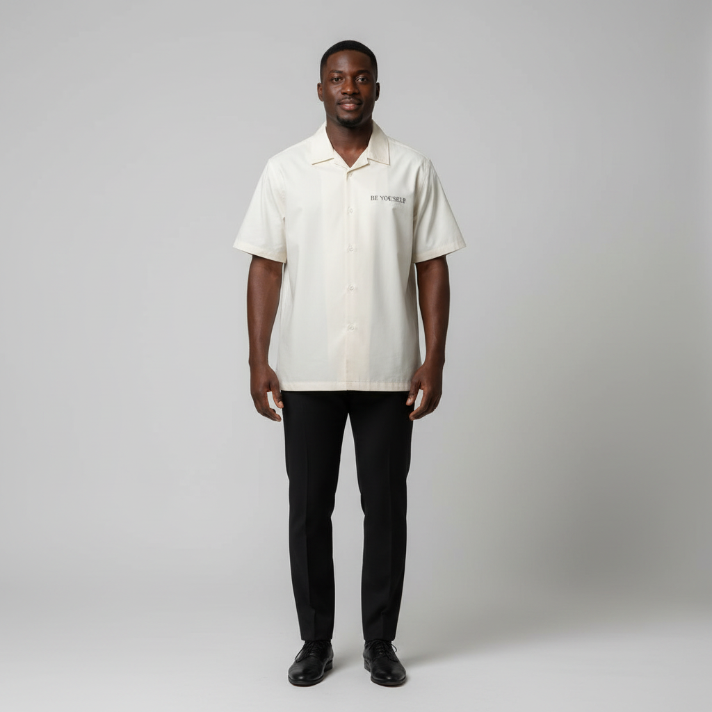 Model wearing the cream camp collar short-sleeve shirt