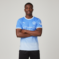 Nigerian male model wearing Manchester City home jersey