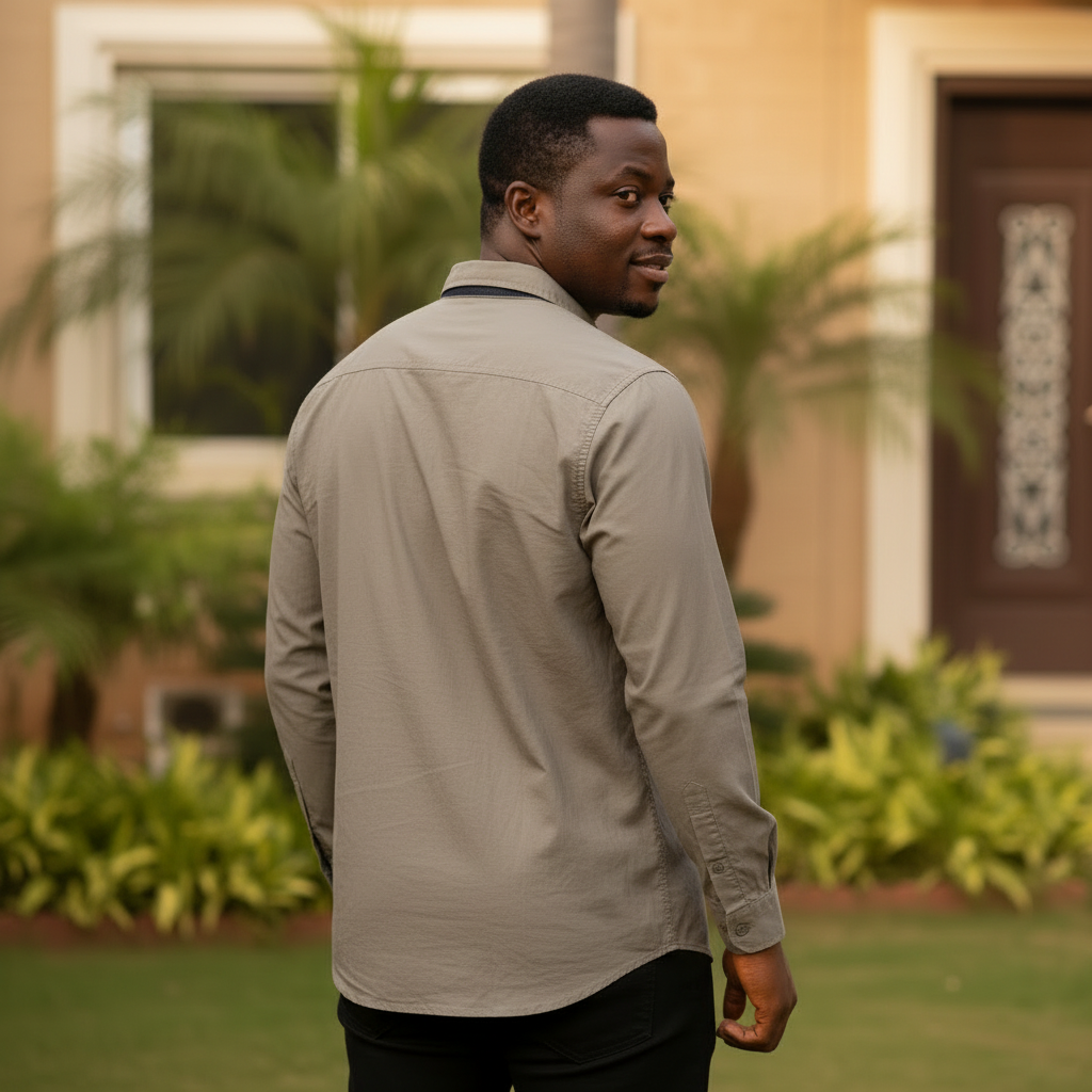 Nigerian male model wearing Khaki Graphic Print Shirt back view
