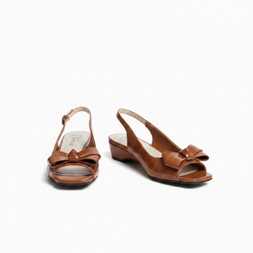Women's tan croc-embossed bow peep-toe wedge slingback sandal - ghost mannequin pair view